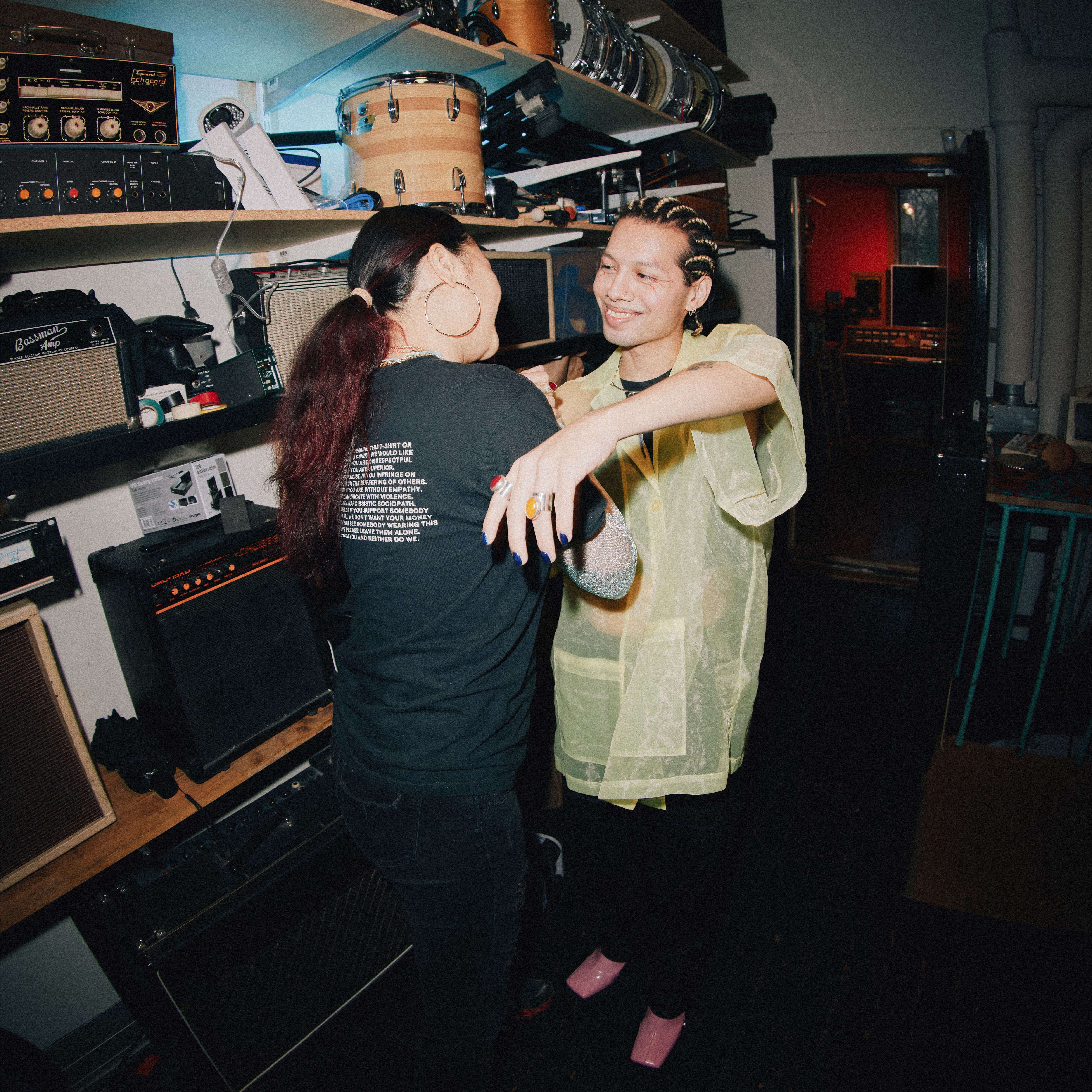 Image of two persons greeting each other