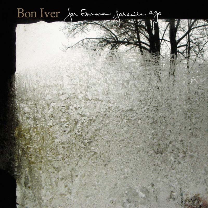 Grainy picture of wooded area with the text "Bon Iver Jon Emma, forever ago"