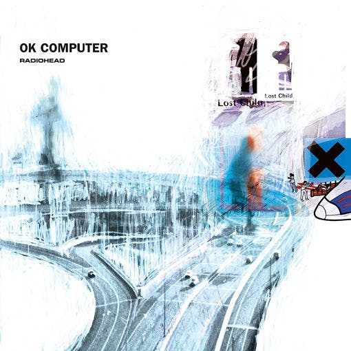 Grainy image of a highway that breaks off into two different directions with the text "OK COMPUTER RADIOHEAD"