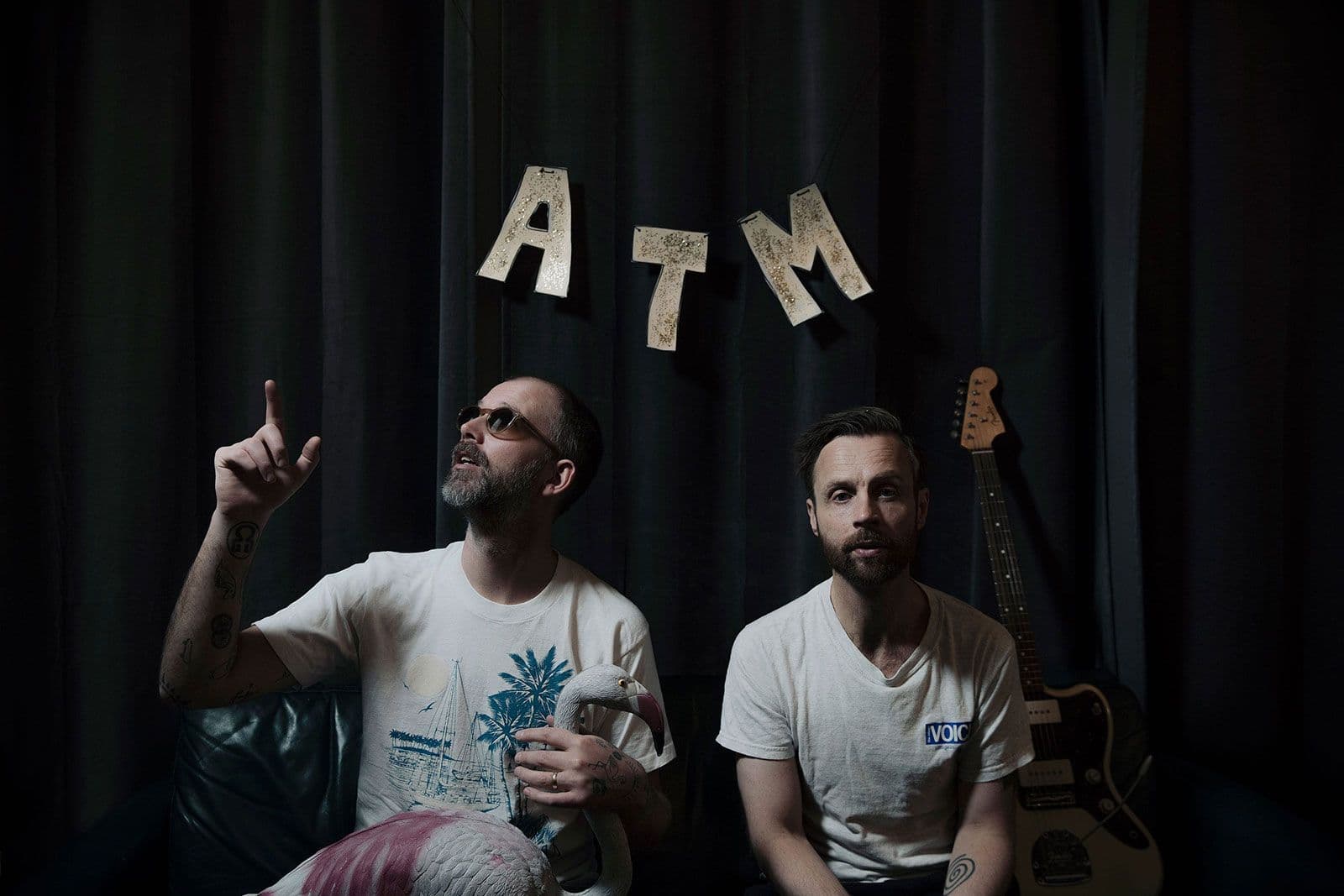 Group ATM with ATM sign in background