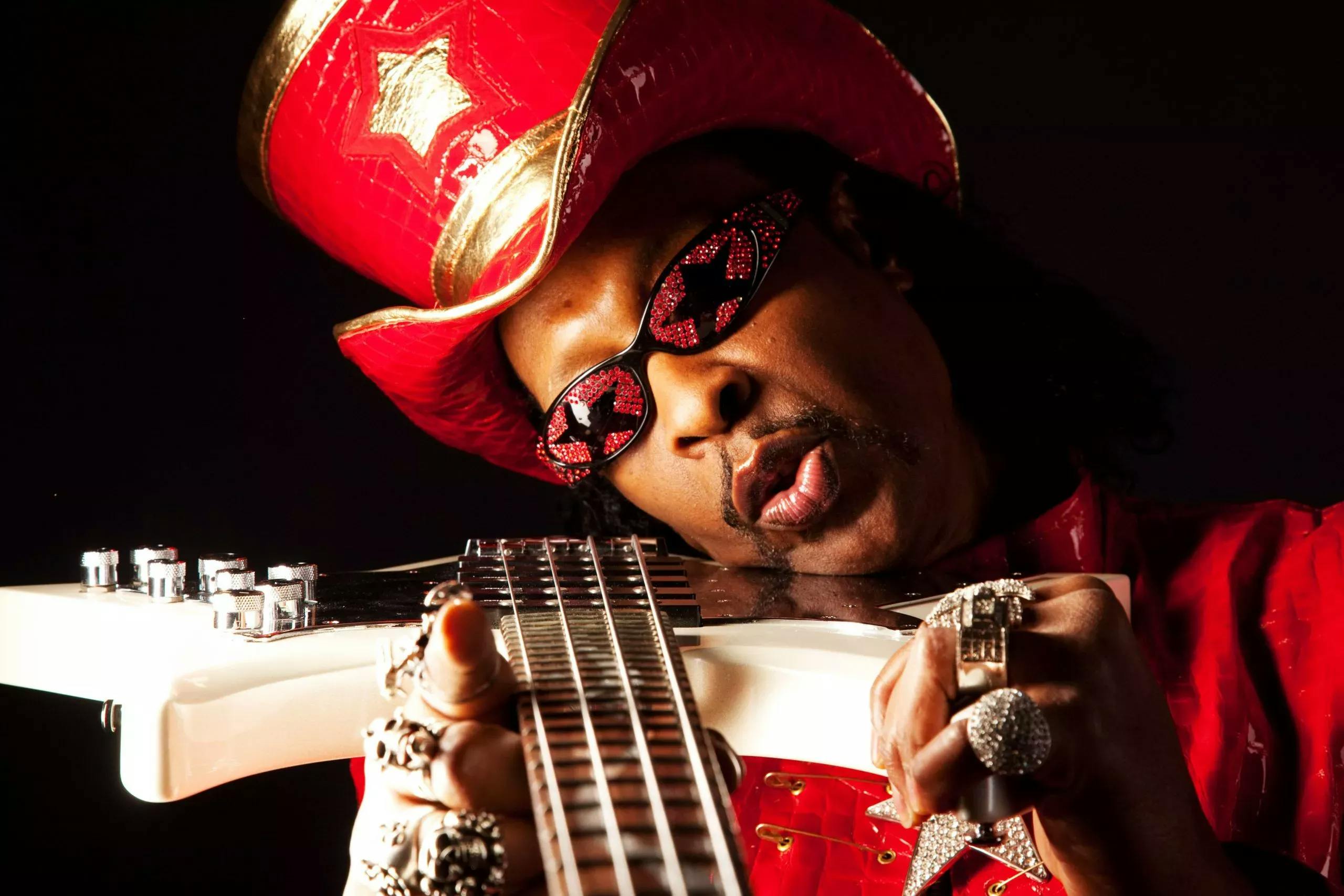 Bootsy Collins holding an electric bass